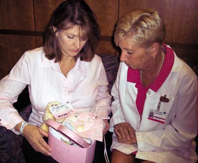 Photo of nurse Pam Magi with stillbirth mother.